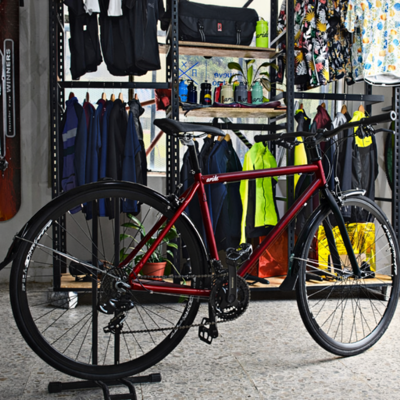 Bicicleta híbrida herradura vinotinto